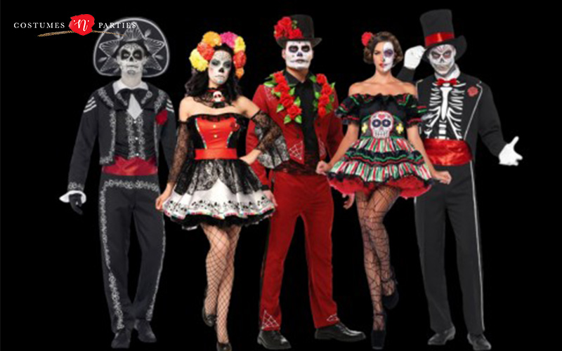 A group of people in Halloween skeleton costumes.